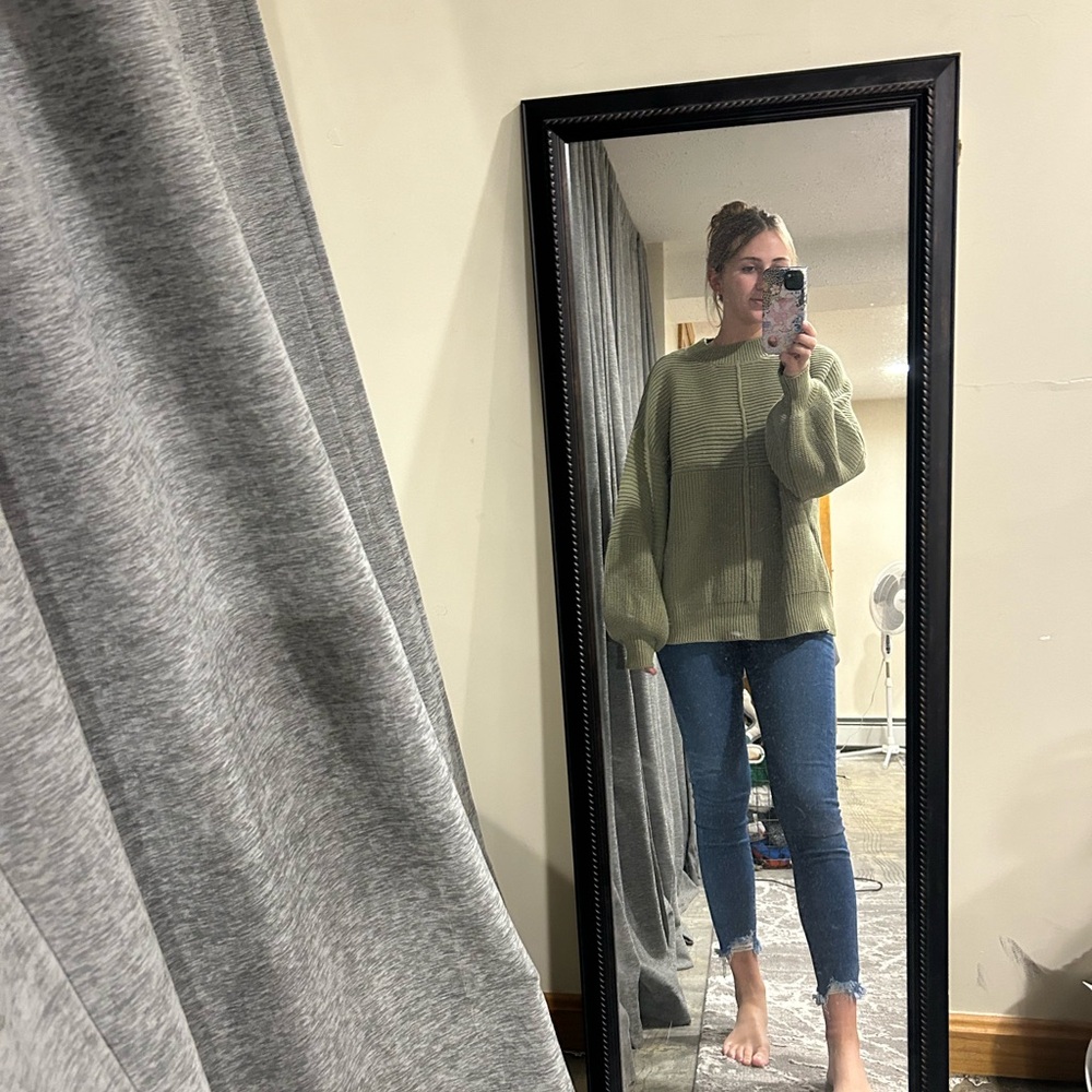 green sweater